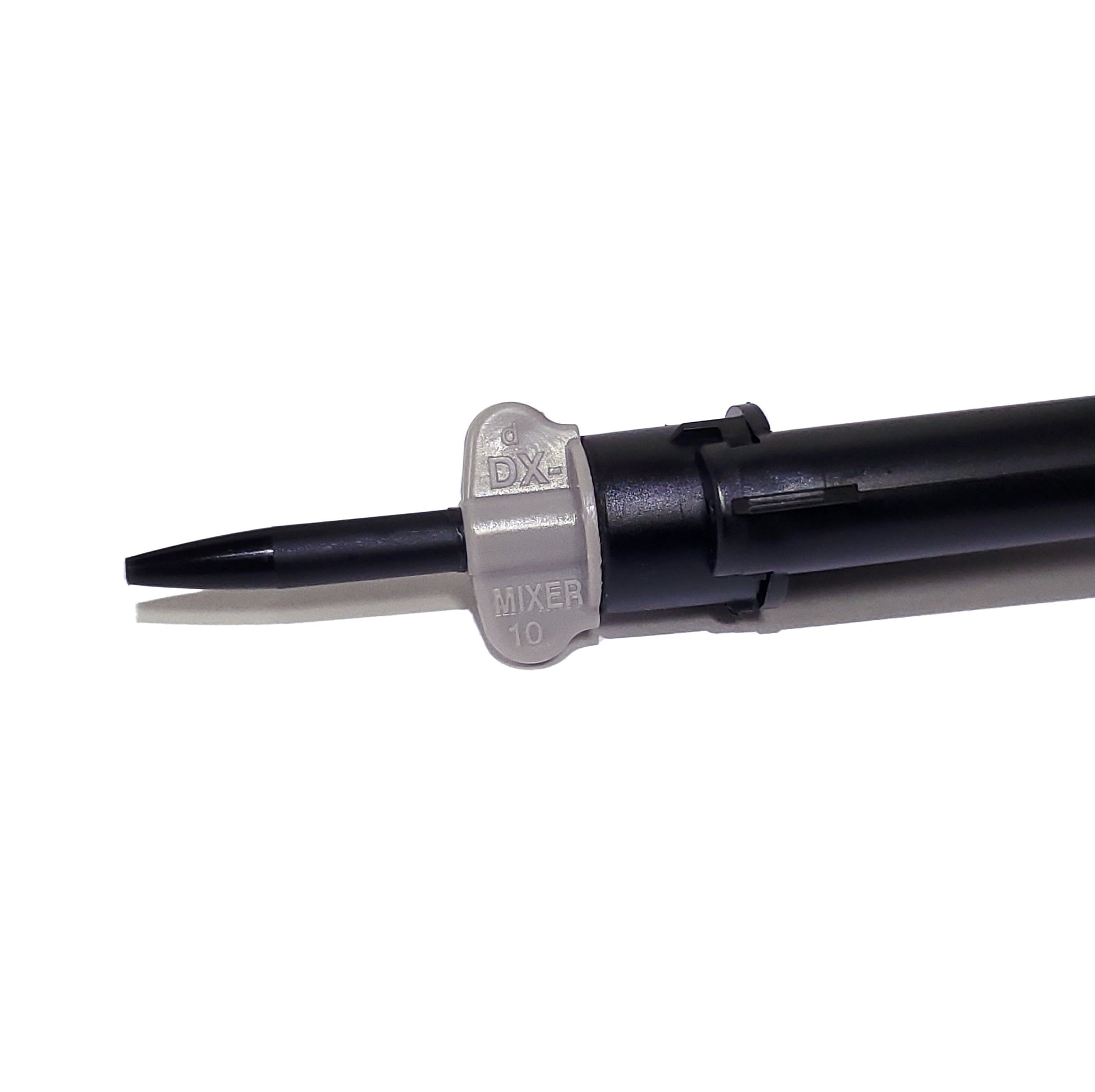 Temporary cement short DX-mixer black mixing tip attached to 5mL syringe.