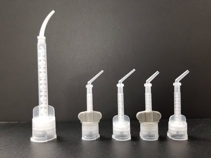 Intra oral tips attached to their respective mixing tips. 