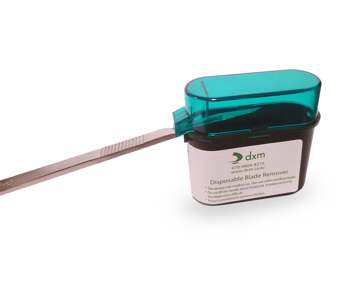 EZ disposable blade remover with scalpel inserted.