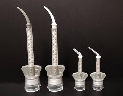 Light body intra oral tips white and gray on light body mixing tips. Endo and core intra oral tips also attached to core buildup mixing tip. 